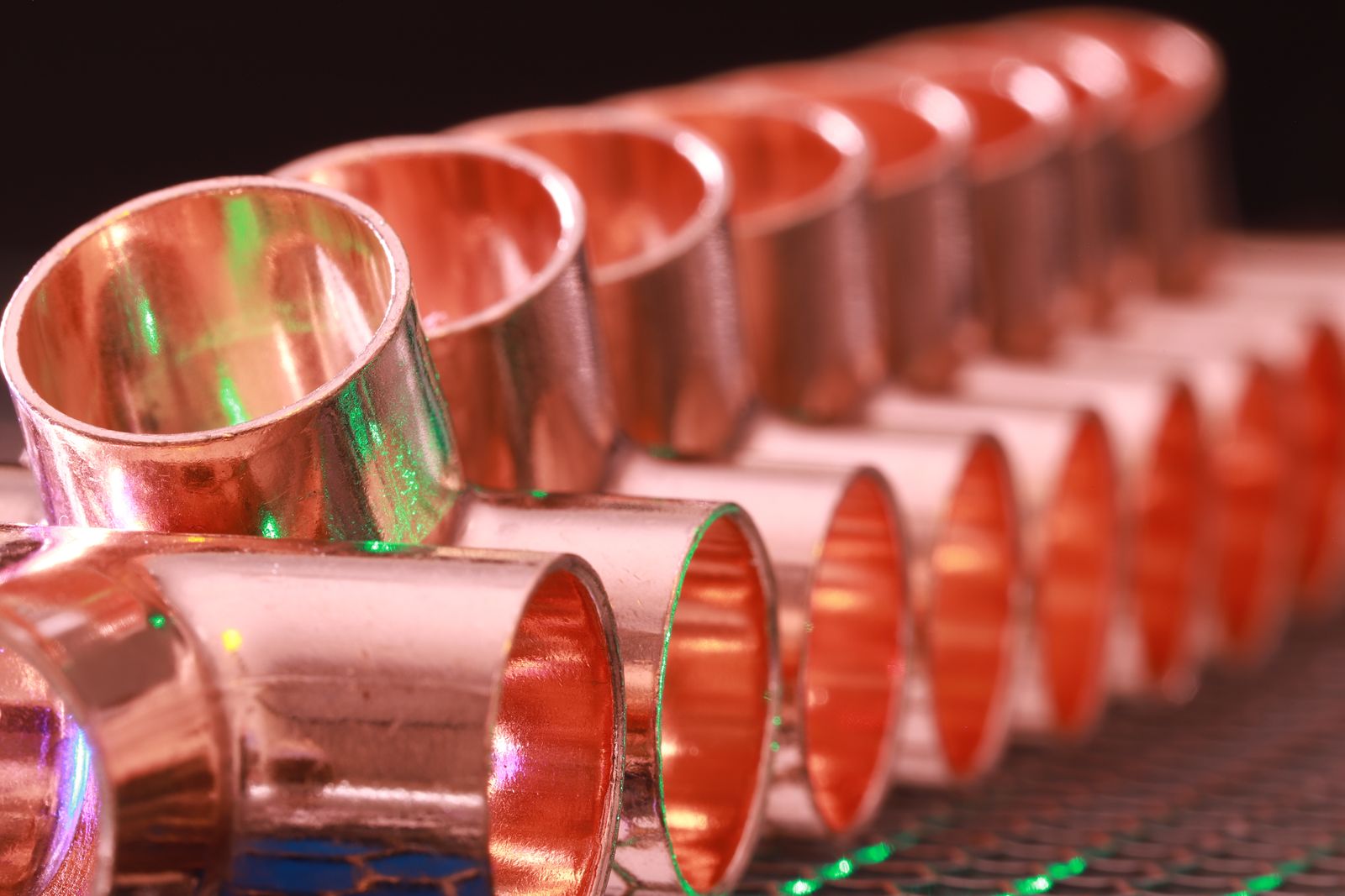 Sample image of copper plumbing fittings in a row